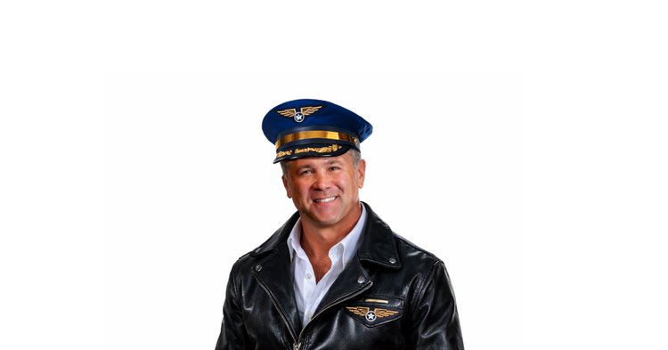 Man in pilot attire discussing Fairhope Airport Authority’s lease & bidding procedures review