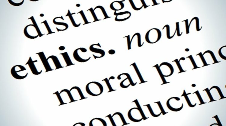 Close-up photo highlights ethics definition, referencing the Ethics Commission’s dismissal of an investigation