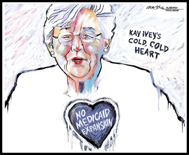 Political cartoon depicting Kay Ivey wearing a shirt reading No Medicaid Expansion, symbolizing opposition to healthcare...