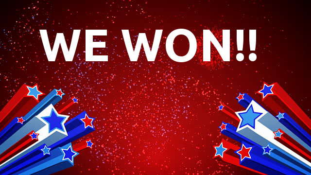 Celebratory graphic announcing a victory, likely related to the Fairhope mayoral election discussed in the article